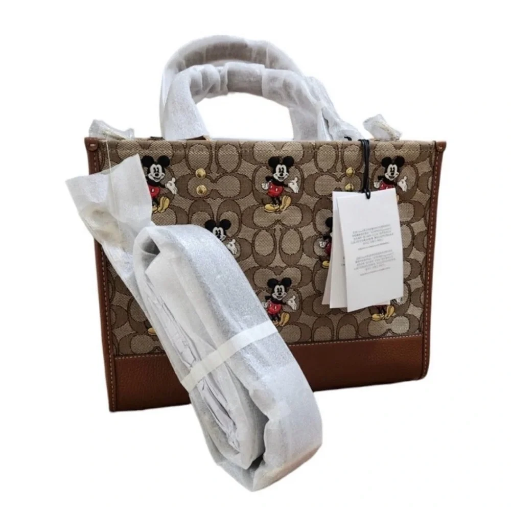 NWT Disney X Coach
Dempsey Carryall in Sig Jacquard
Mickey Mouse Msrp:$528 - Picture 8 of 13